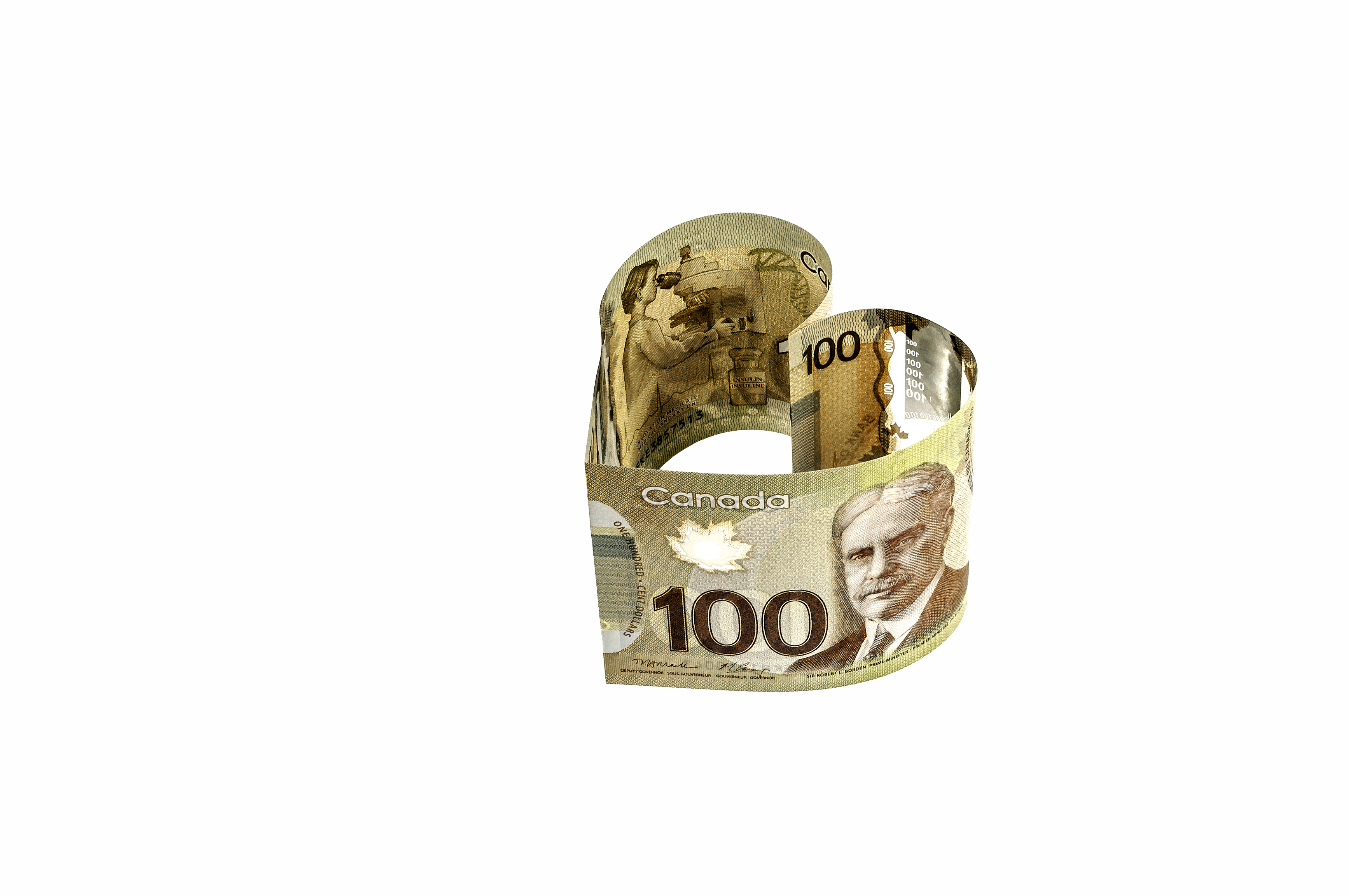 Billets canadiens de cent dollars recourbés en forme de cœur.