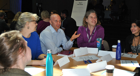 Statistics Canada employees discuss their ideas and share their views at a town hall session held in June 2018 to develop a vision statement.